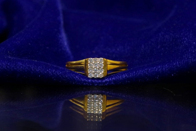 Classic diamond engagement ring with gold band and sparkling center stone